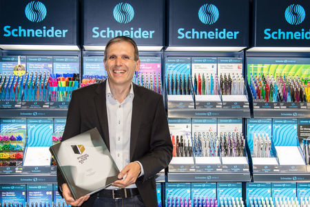 CEO Frank Groß proudly presents the German Brand Award Book 2017 including Schneider